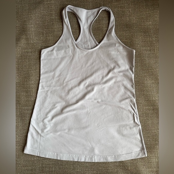 lululemon athletica Tops - Lululemon Racerback Tank Top light blue missing size and material tag.